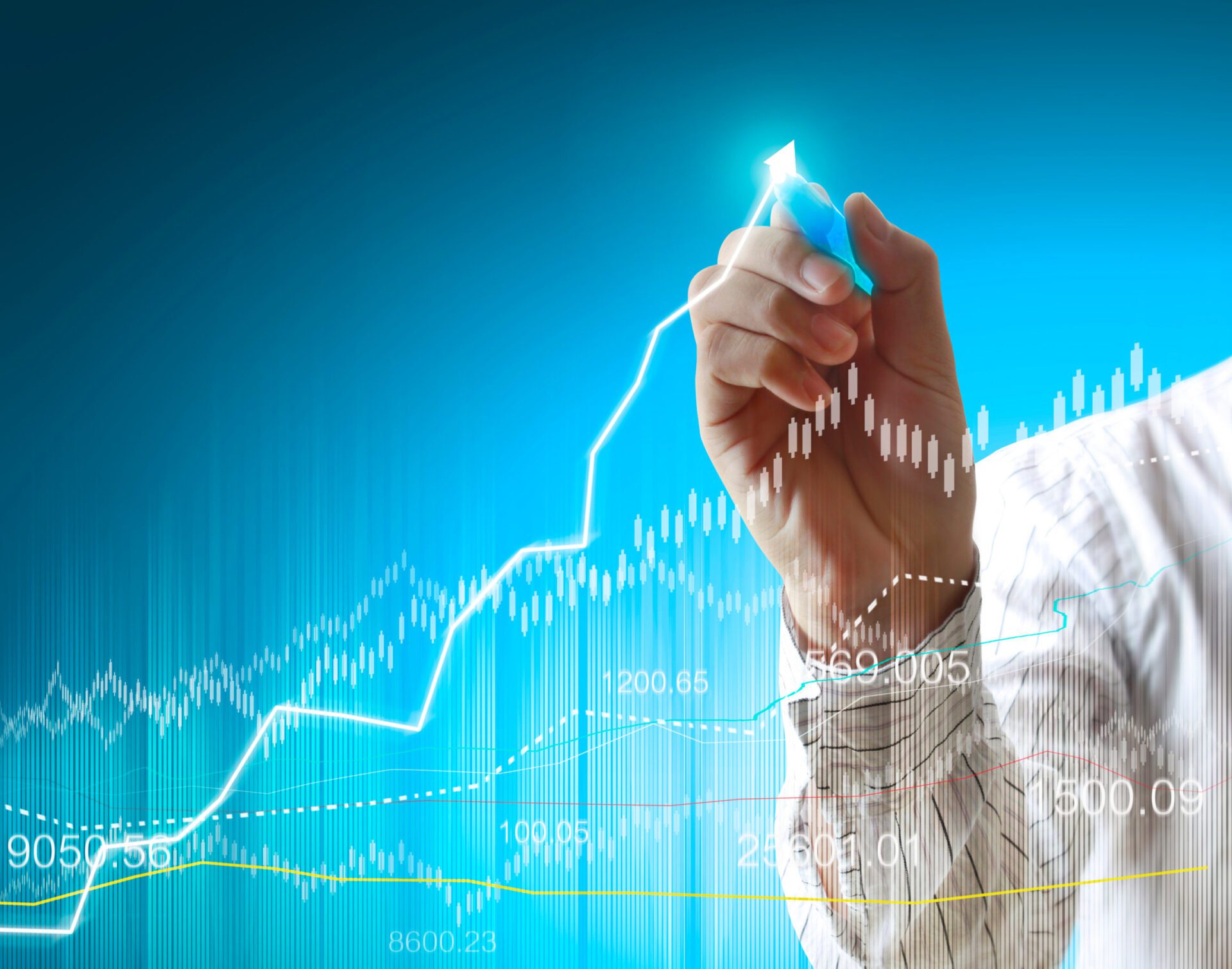 businessman hand writing business graph